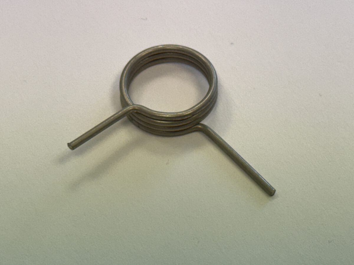 Schenkelfeder mit radialen Schenkeln